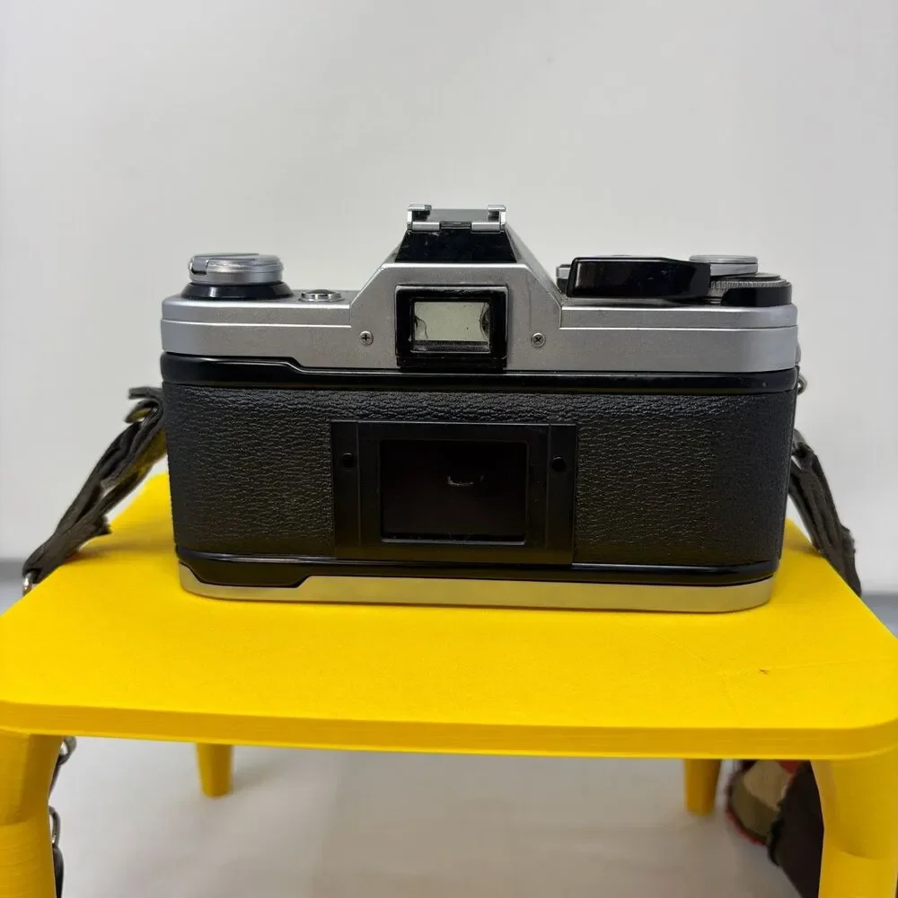 Canon AE-1 35mm SLR Film Camera W/ 2 Lens, Flash, Case, Paperwork UNTESTED